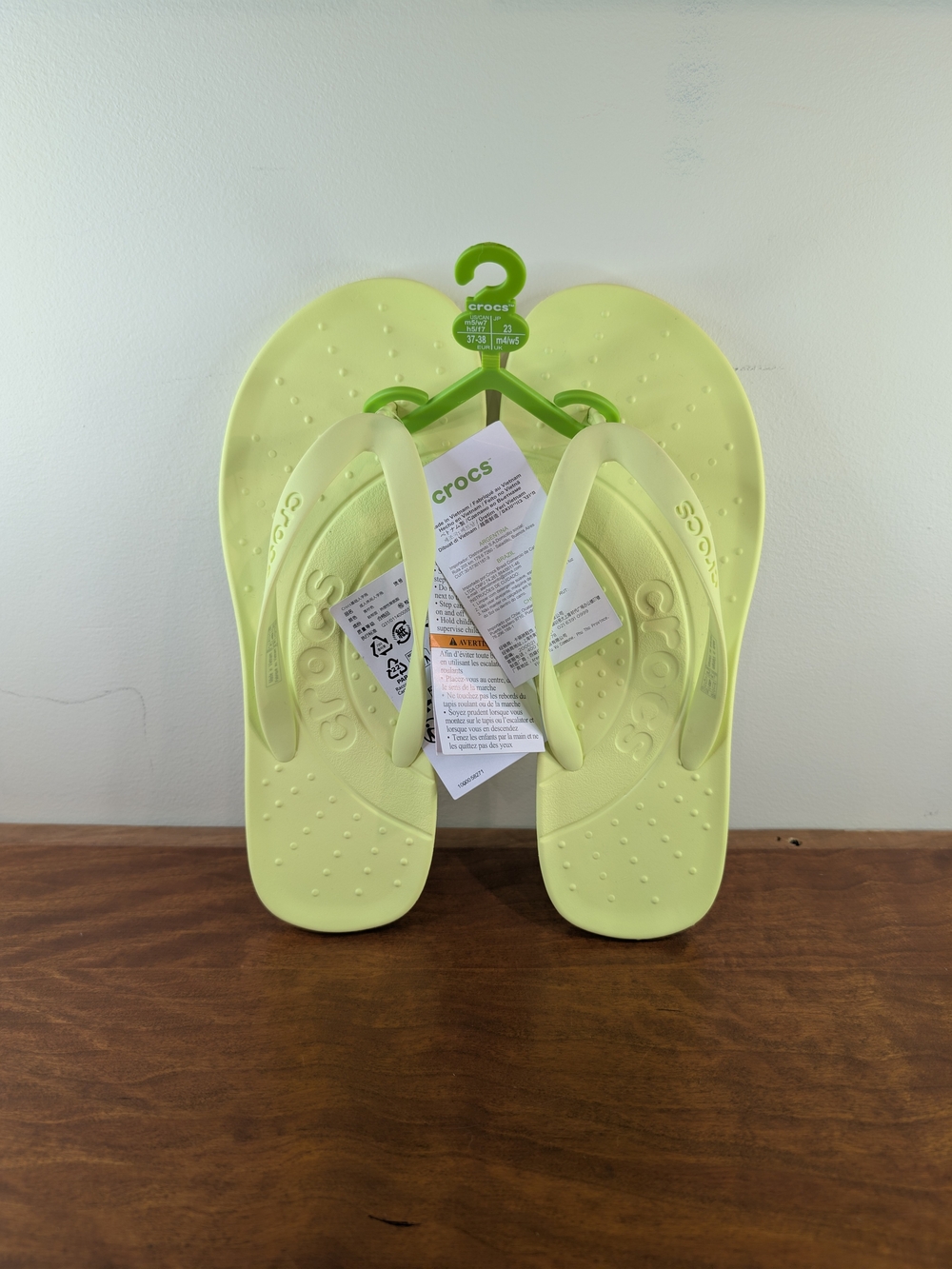 Crocs Kids' LiteRide Flip Sandals in Pale Yellow